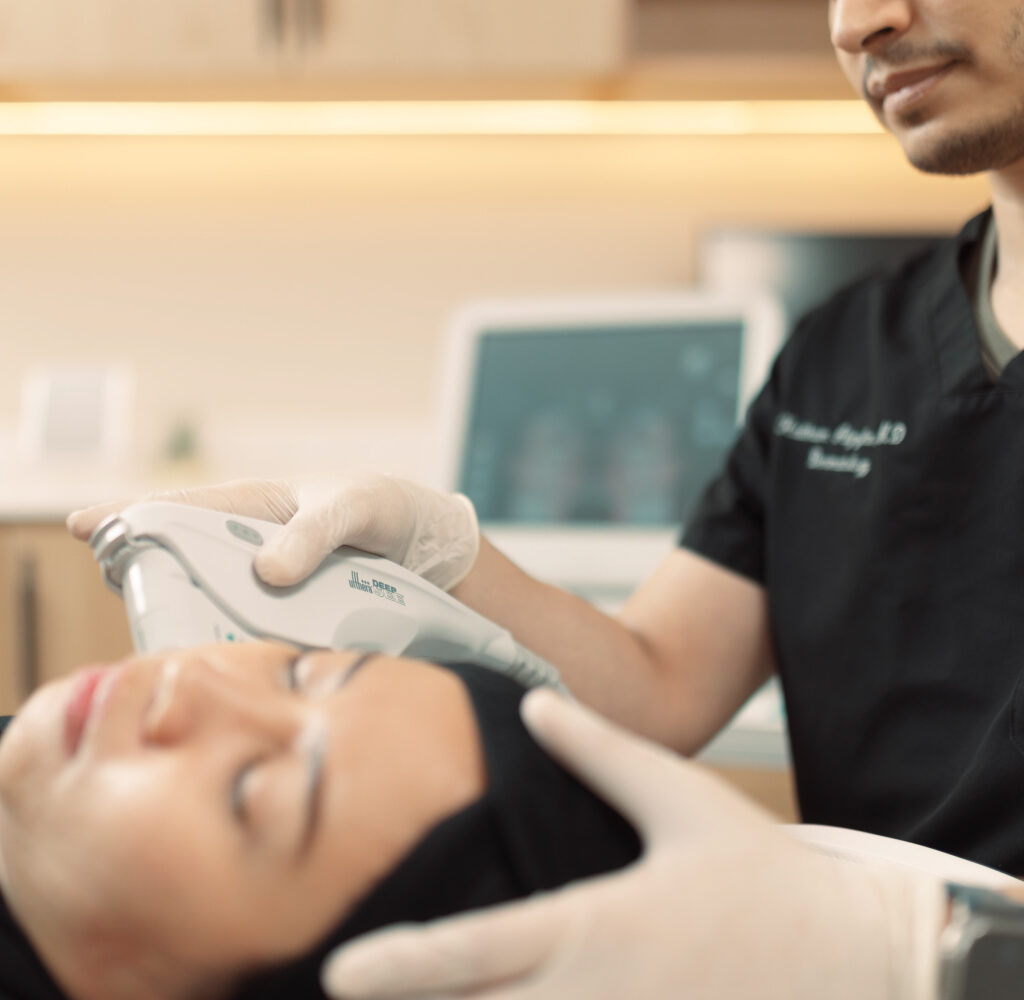 Patient undergoing laser treatment at Reveal Clinics Riyadh