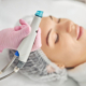 HydraFacial device suction tip during deep pore cleansing
