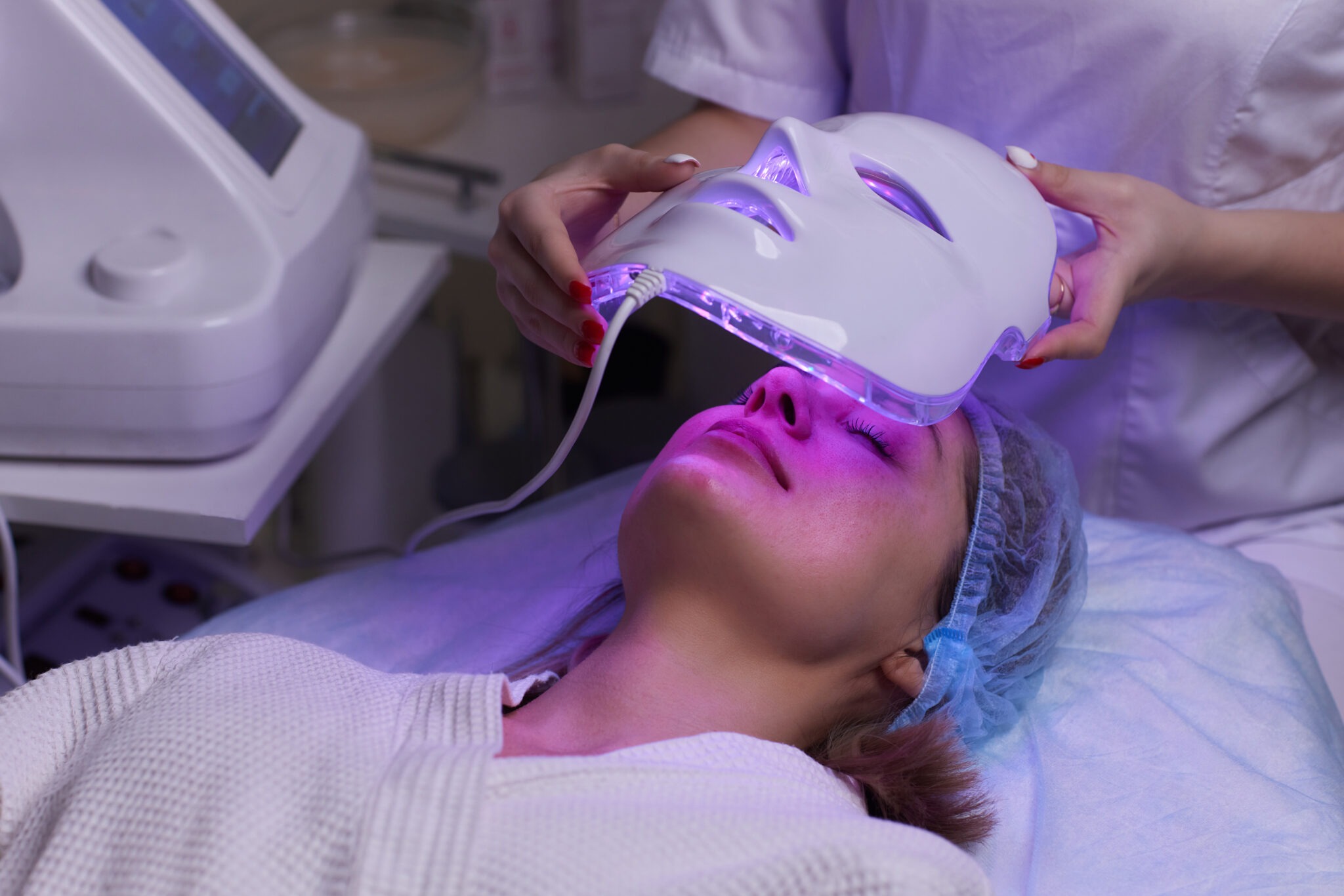 Client undergoing LED light therapy after HydraFacial