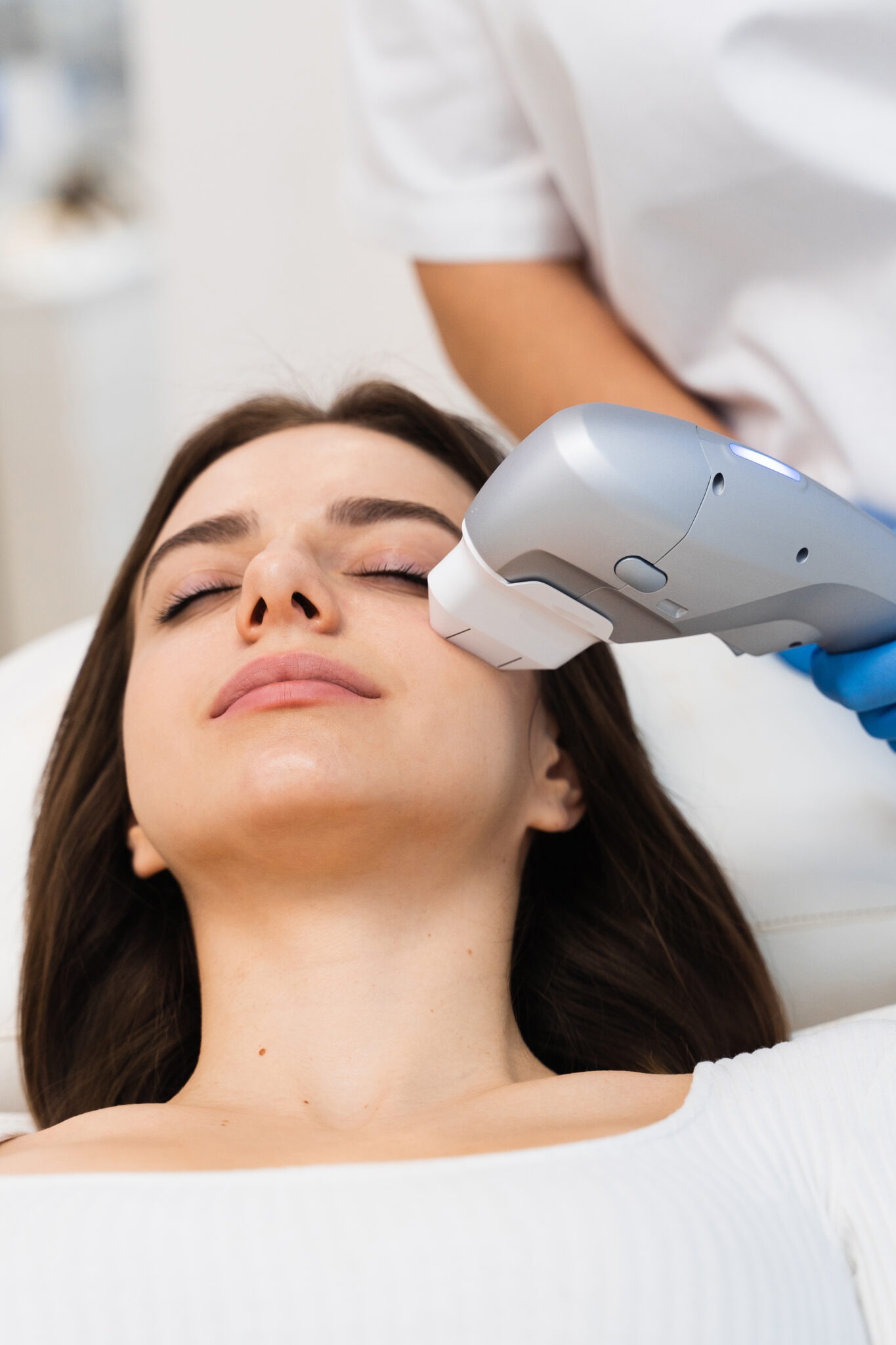 Close-up of laser beauty treatment being performed at Reveal Clinics Riyadh