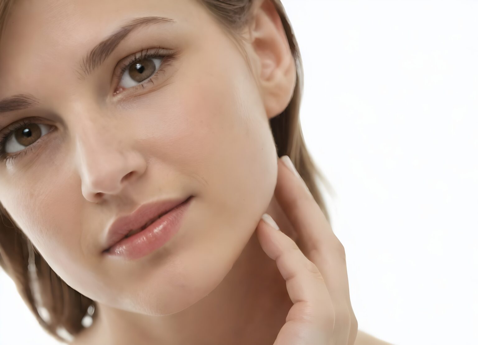 Woman with glowing, even-toned skin after laser beauty treatment.