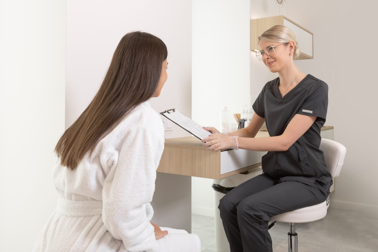 Dermatologist explaining chemical peel aftercare during winter season