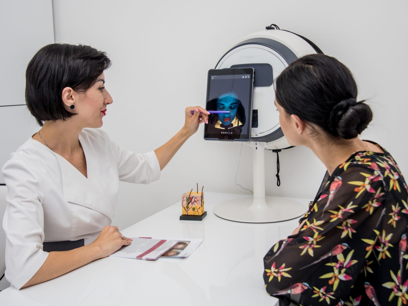 Skin analysis session at aesthetic clinic