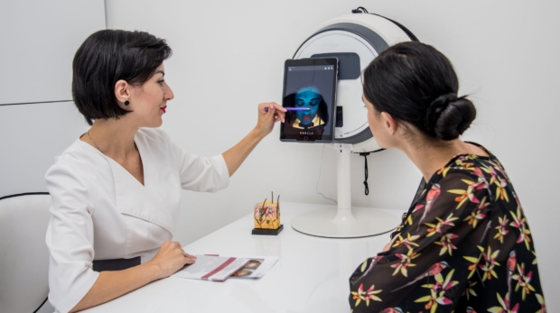 Skin analysis session at aesthetic clinic