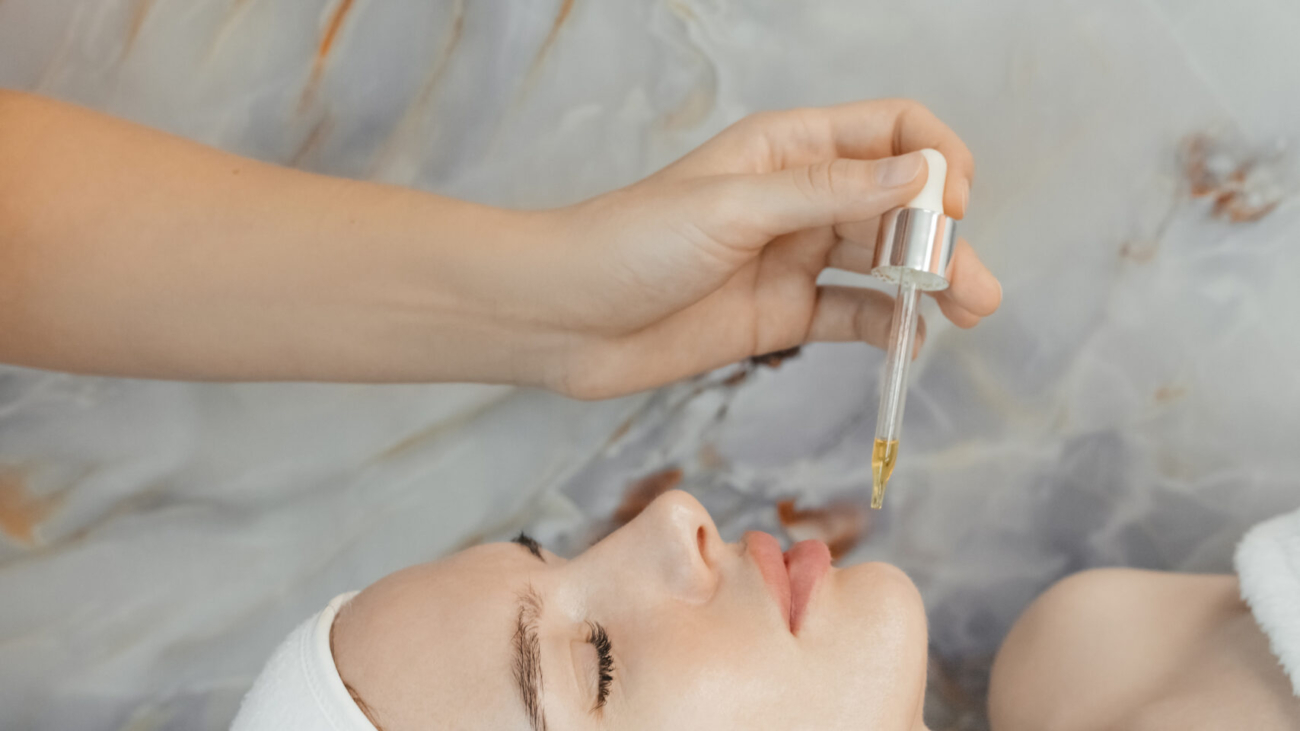 Woman receiving a hydrating facial treatment