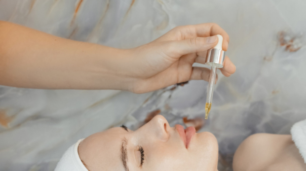 Woman receiving a hydrating facial treatment